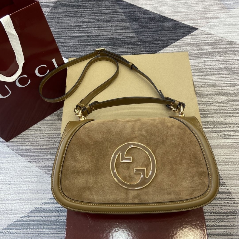 G*u*i top handle bags
